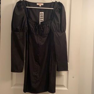 Mini dress with sleeves, small cut out at bust, can loosen or close with tie